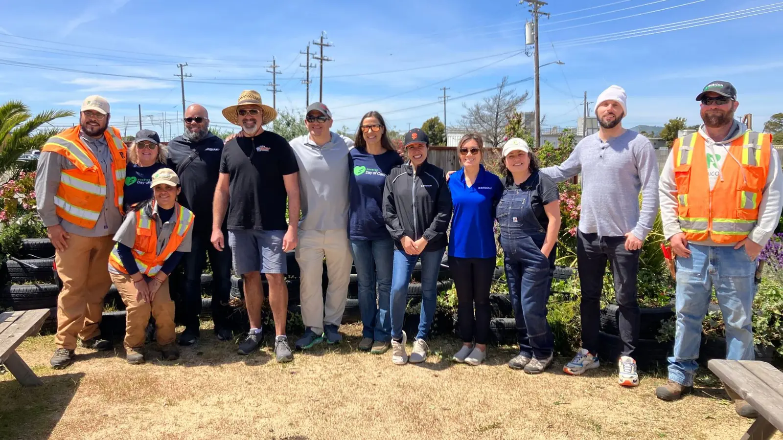 Rubicon crew members and community partners standing together at a garden site